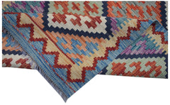 A handmade Afghan Maimana wool kilim runner featuring a colorful geometric pattern.
