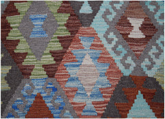 Handwoven Afghan Maimana kilim runner featuring a geometric diamond pattern in multicolored wool.