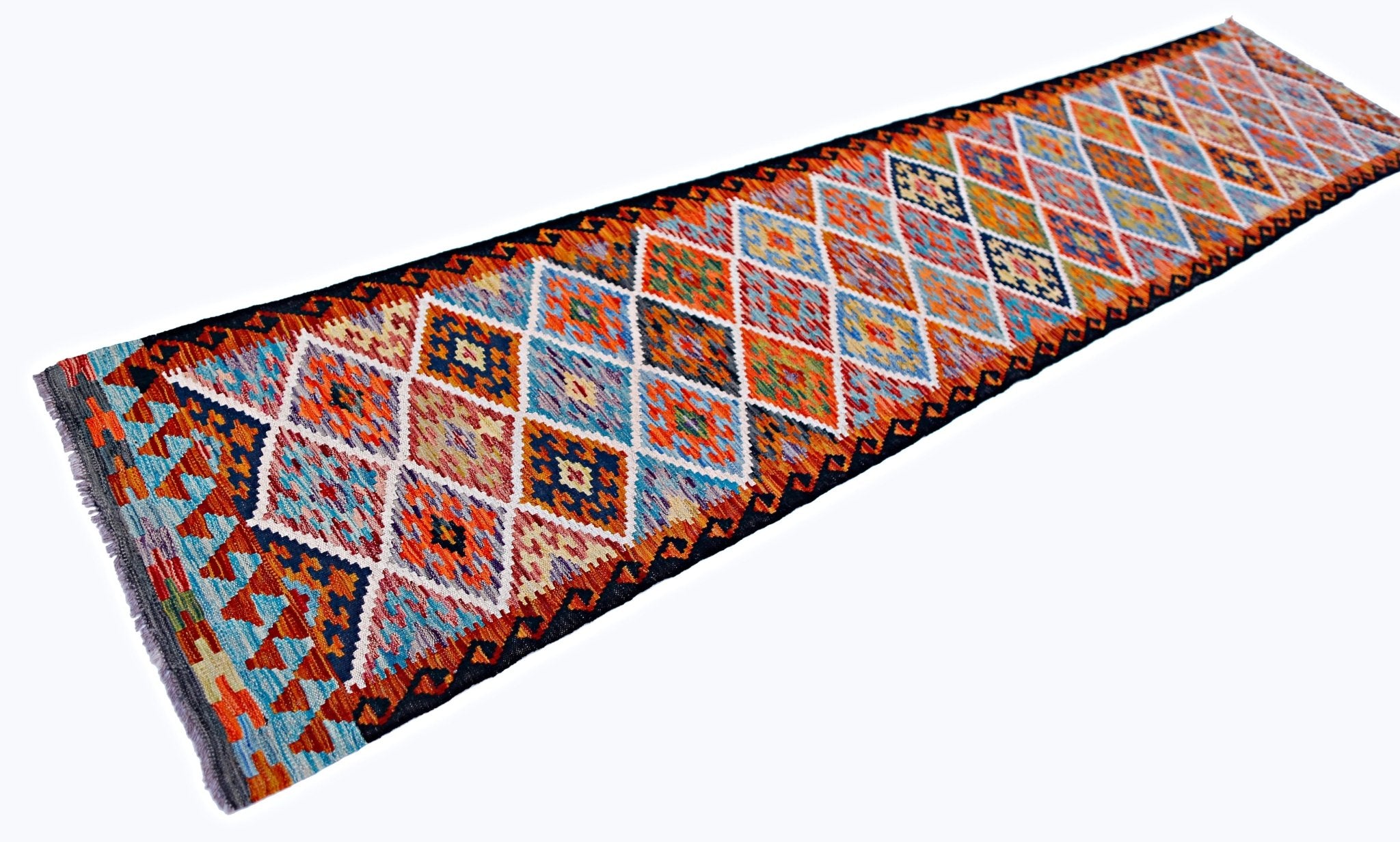 Handwoven Afghan Maimana wool runner featuring a vibrant geometric diamond pattern.