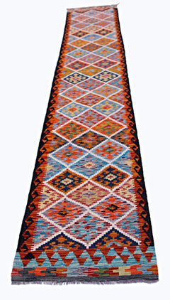 Handwoven Afghan Maimana wool runner featuring a vibrant, multi-colored geometric diamond pattern.