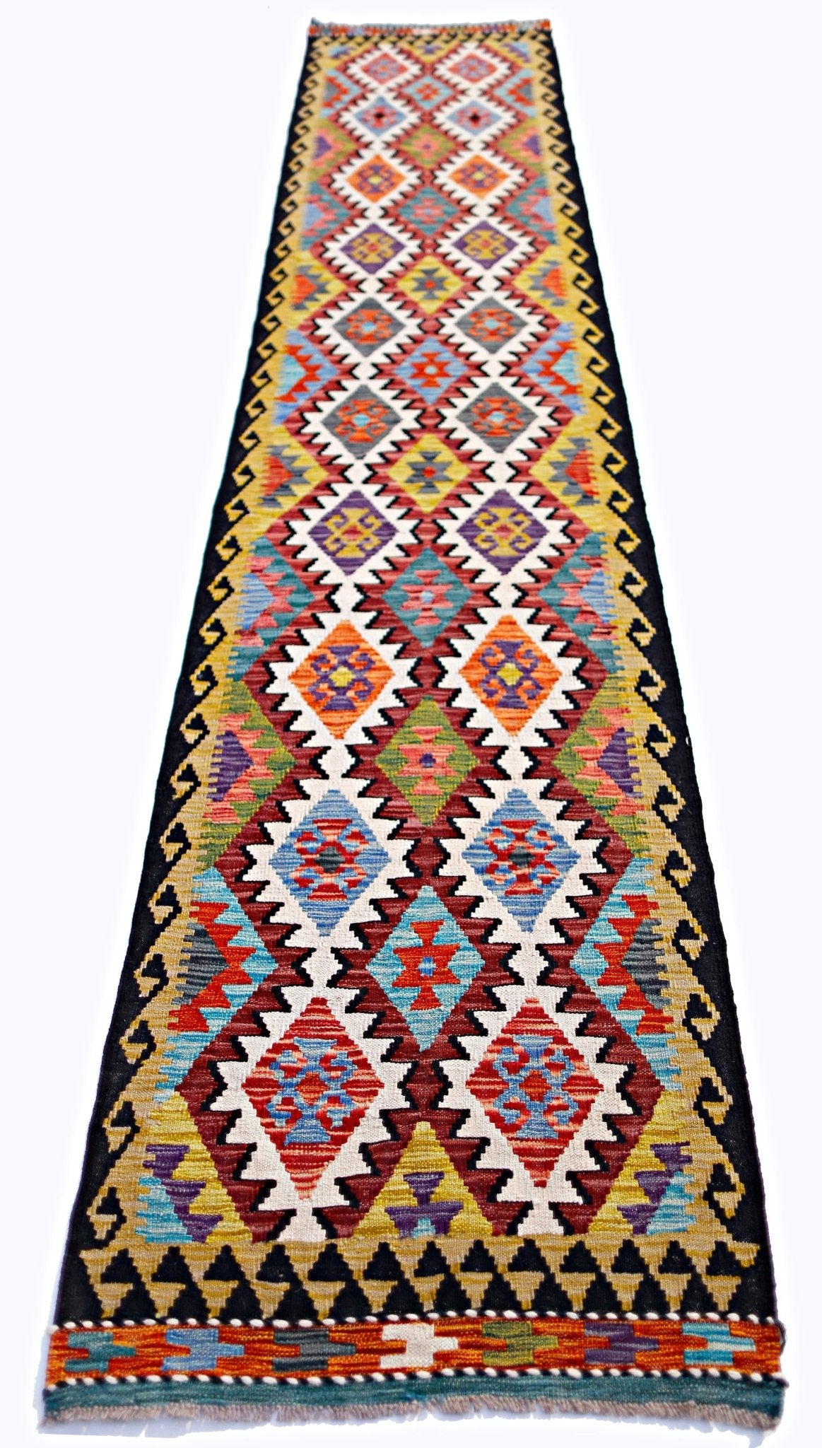 Handwoven Afghan Maimana wool runner rug featuring a vibrant geometric diamond pattern.