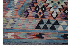 Handwoven Afghan Maimana wool runner featuring a geometric pattern in blue, pink, and black.
