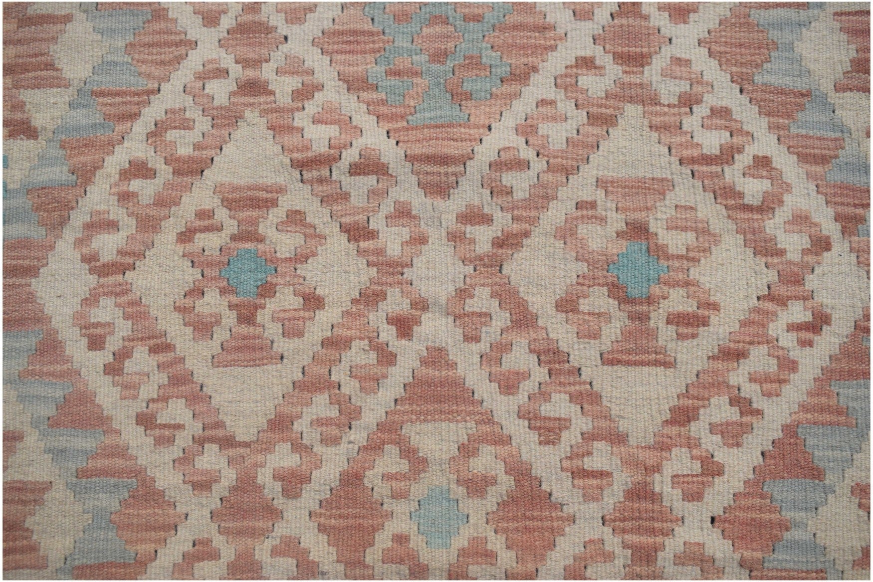 Handmade Afghan Maimana kilim runner featuring a geometric diamond pattern in pink and blue.