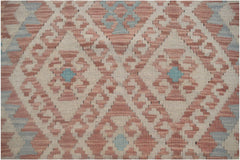 Handmade Afghan Maimana kilim runner featuring a geometric diamond pattern in pink and blue.