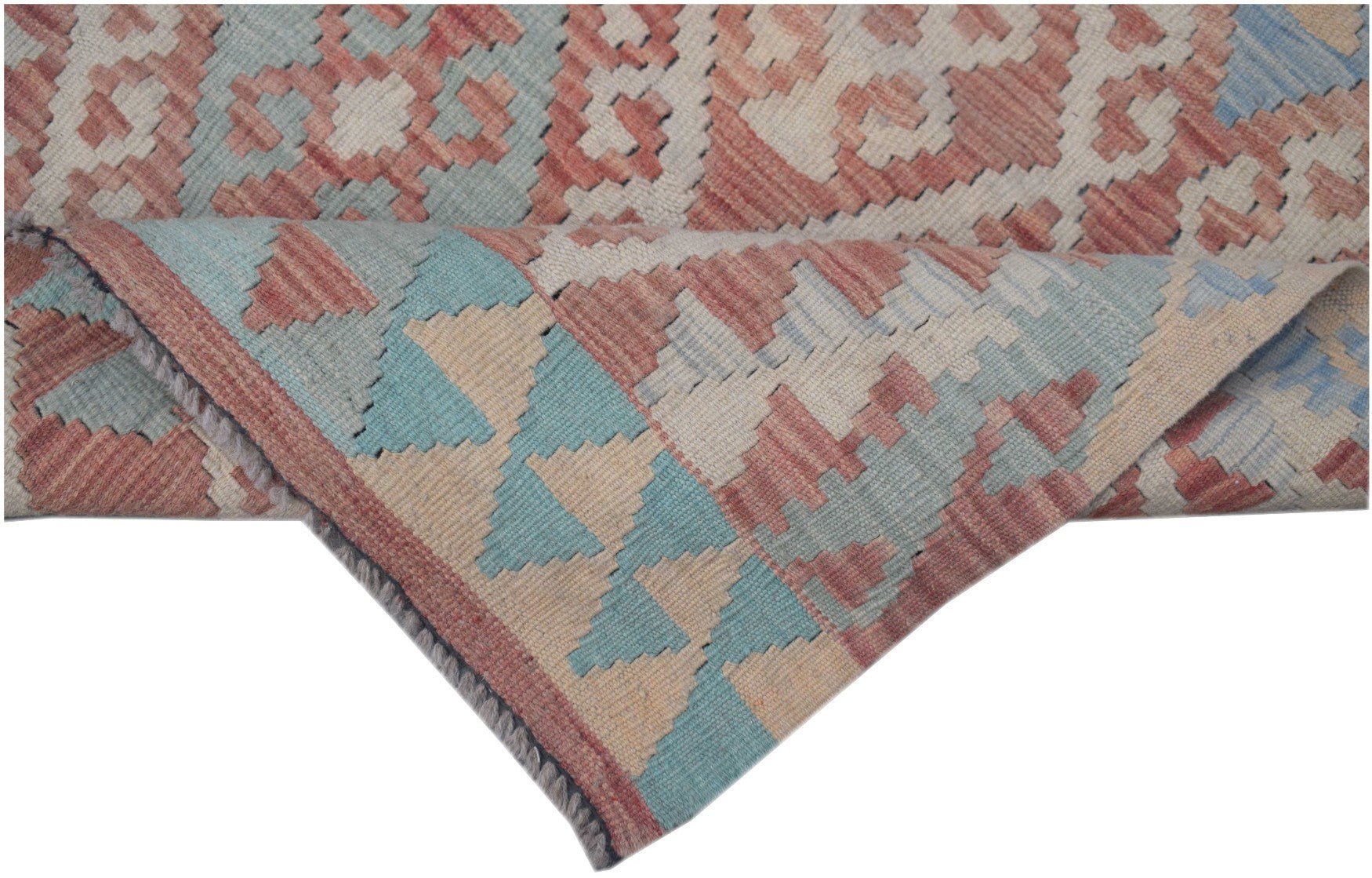 A handmade Afghan Maimana kilim runner featuring a geometric pattern in red, blue, and beige.