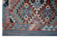 Handwoven Afghan Maimana wool runner featuring a geometric diamond pattern in blue, red, and white.