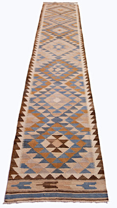 Handwoven Afghan Maimana wool runner featuring a geometric diamond pattern in blue and tan tones.