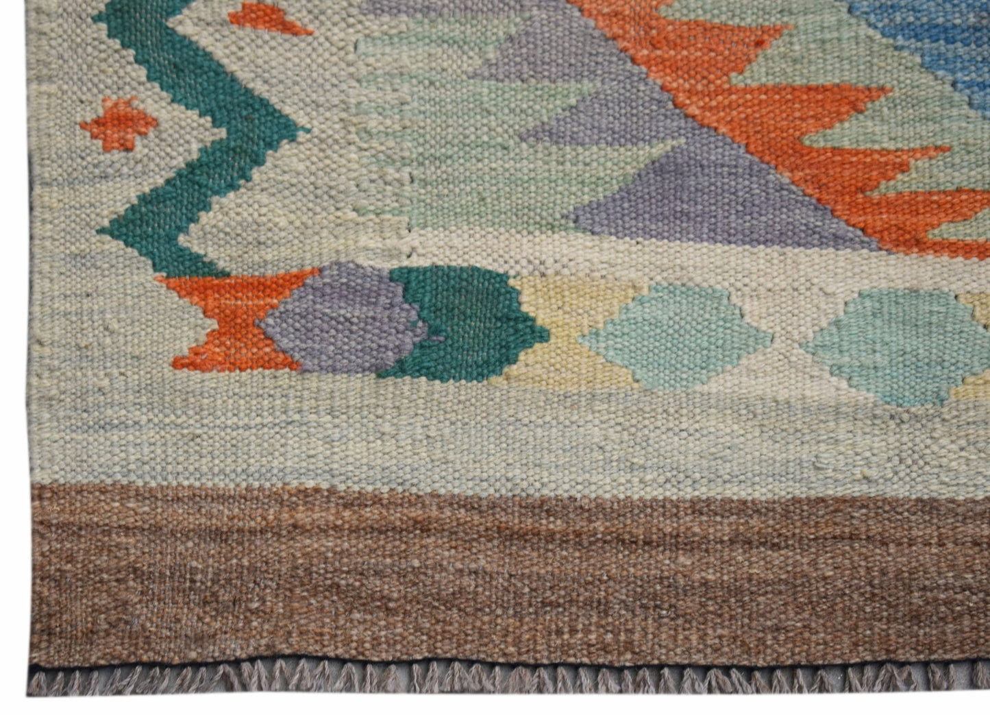 A handwoven Afghan Maimana wool kilim runner featuring geometric patterns in vibrant colors.