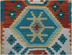 Handwoven Afghan Maimana kilim runner featuring a geometric pattern in teal, orange, and cream.
