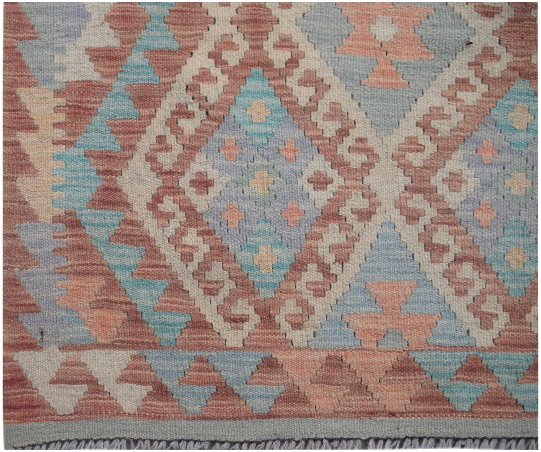 Handmade Afghan Maimana kilim runner featuring a geometric diamond pattern in muted earth tones.