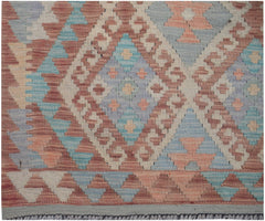 Handmade Afghan Maimana kilim runner featuring a geometric diamond pattern in muted earth tones.