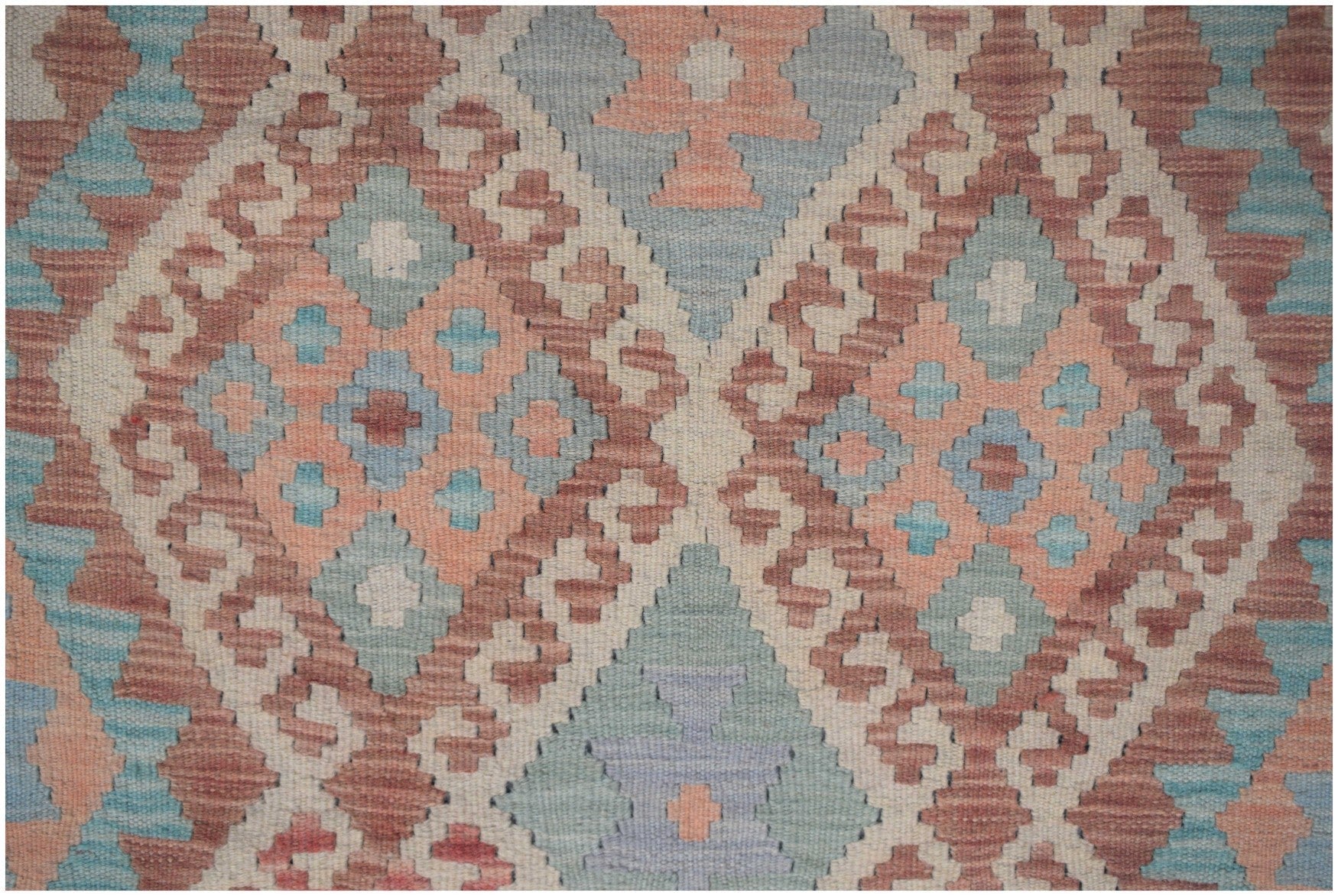 Handmade Afghan Maimana kilim runner featuring a geometric diamond pattern in muted earth tones.