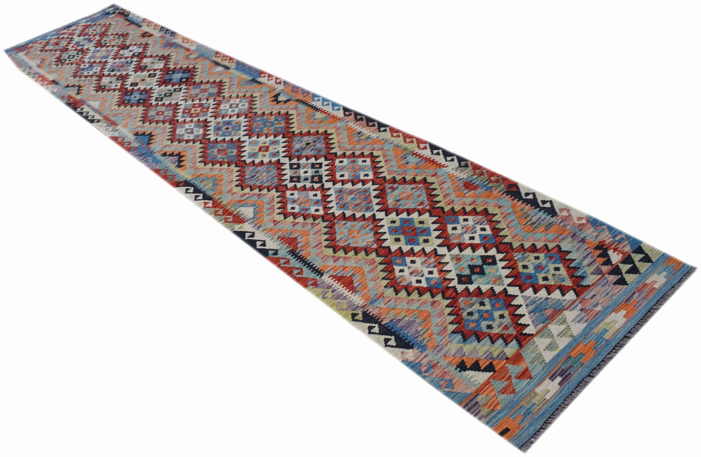 Handwoven Afghan Maimana wool runner rug featuring a colorful geometric diamond pattern.