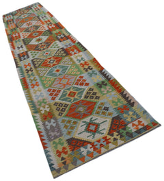 Handwoven Afghan Maimana wool runner rug featuring a colorful geometric pattern.