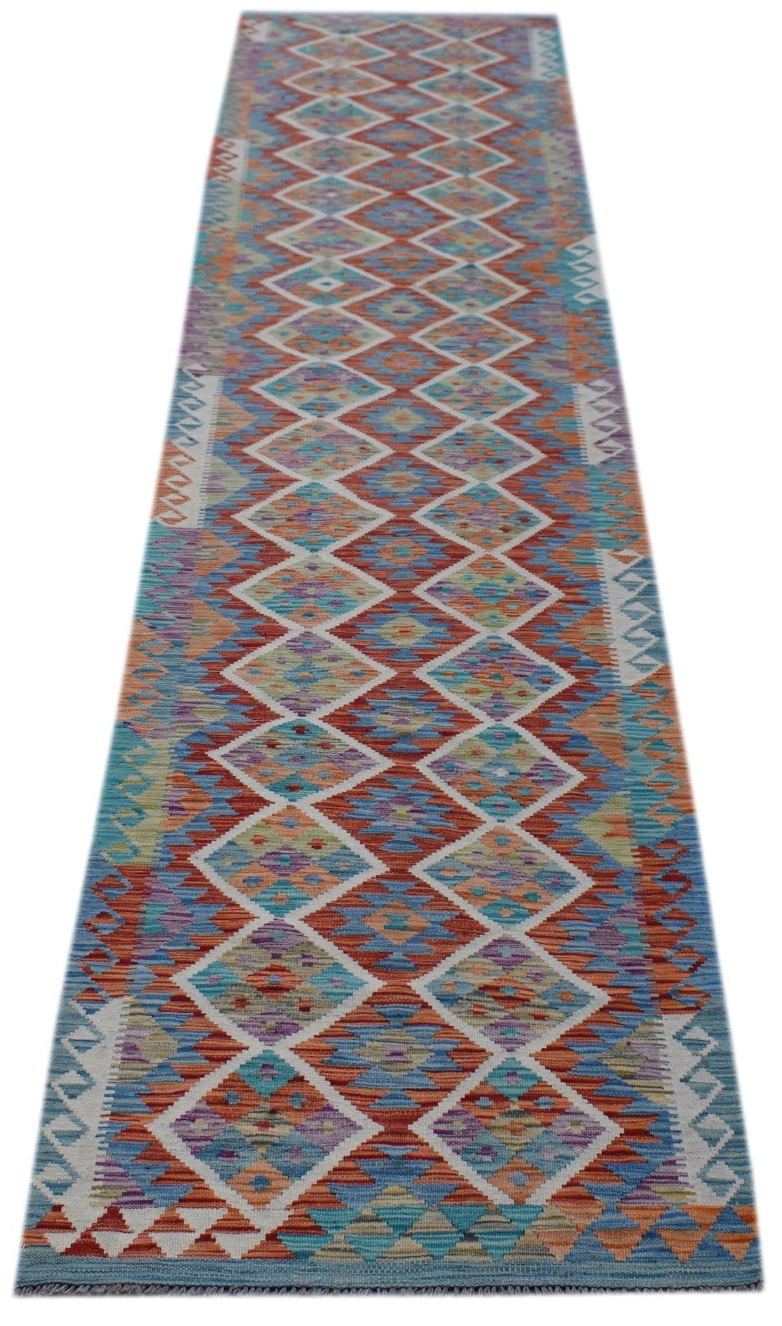Handwoven Afghan Maimana wool runner featuring a colorful geometric diamond pattern.