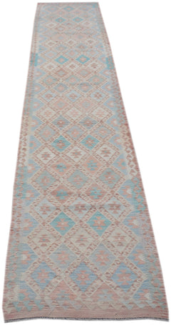 A handmade Afghan Maimana kilim runner featuring a geometric diamond pattern in blue and pink.