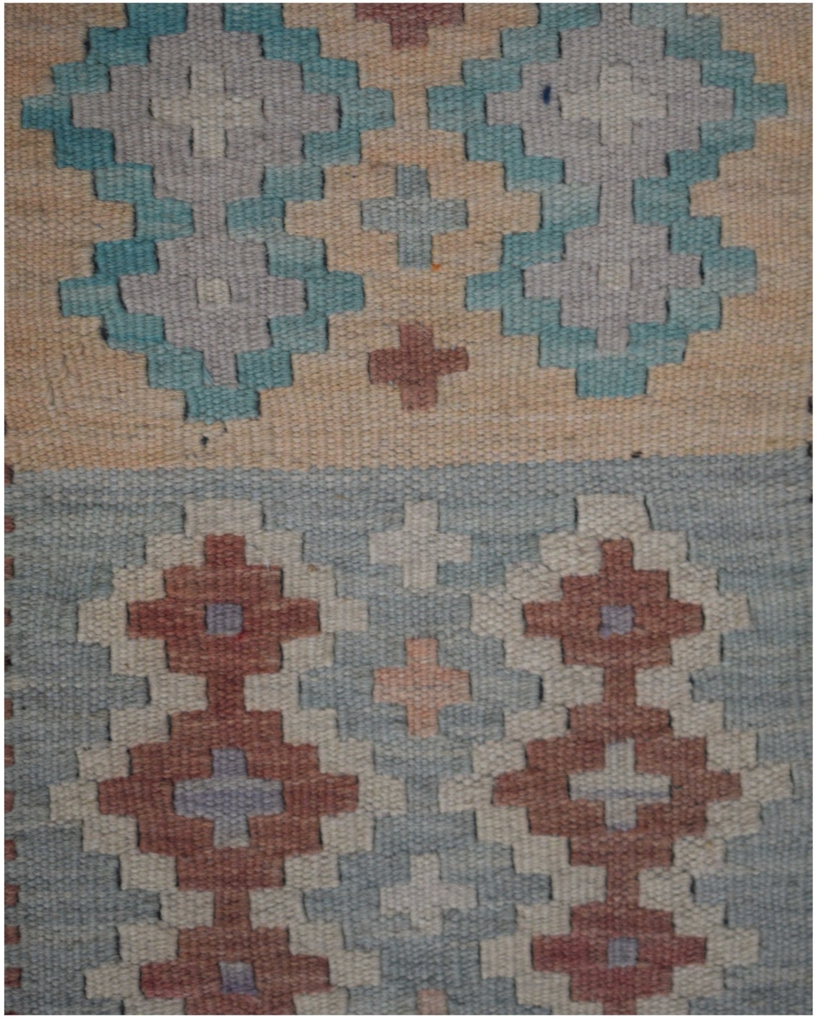 Handmade Afghan Maimana kilim runner featuring geometric patterns in blue, tan, and terracotta.