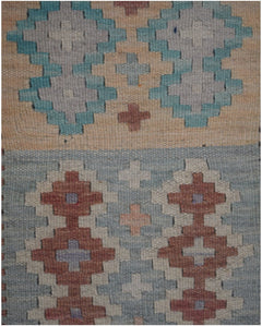 Handmade Afghan Maimana kilim runner featuring geometric patterns in blue, tan, and terracotta.