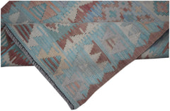 A handmade Afghan Maimana Kilim runner featuring a geometric pattern in blue, red, and beige.