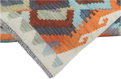Handmade Afghan Maimana kilim runner featuring a geometric pattern in vibrant, multi-colored wool.