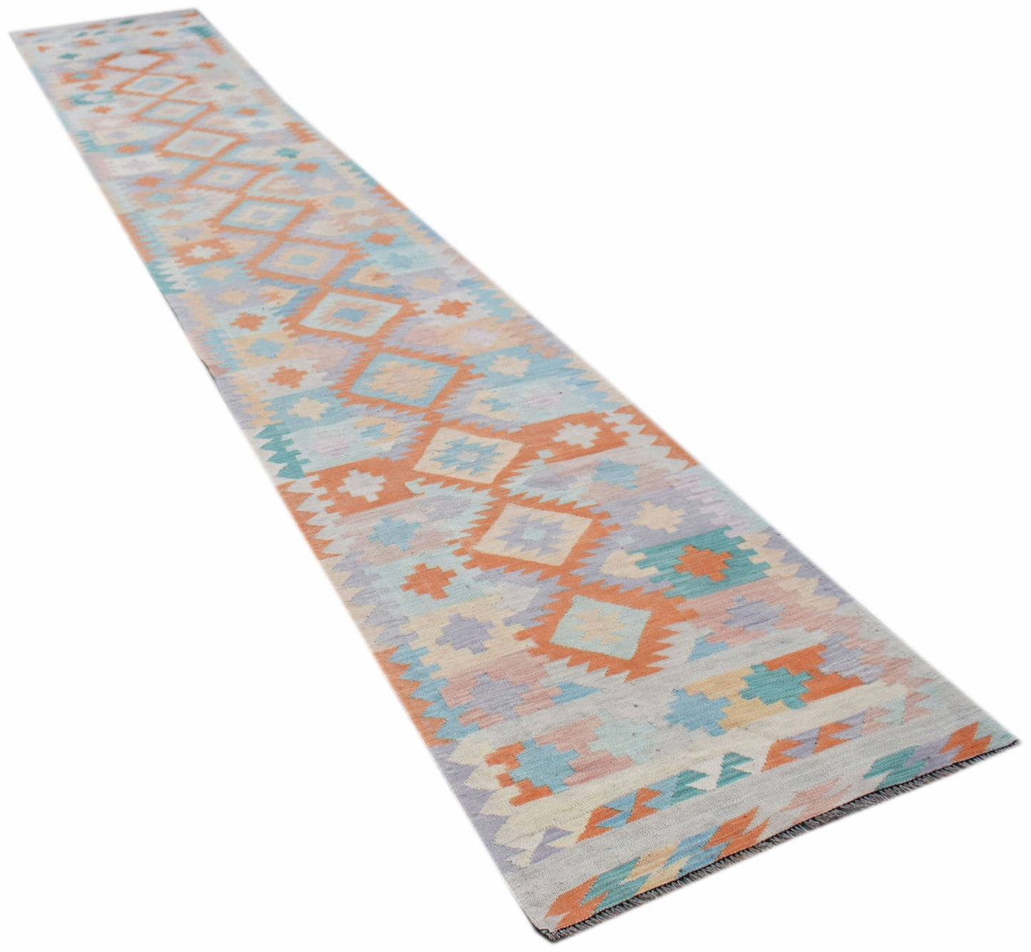 A long, handmade Afghan Maimana kilim runner featuring a geometric pattern in pastel colors.
