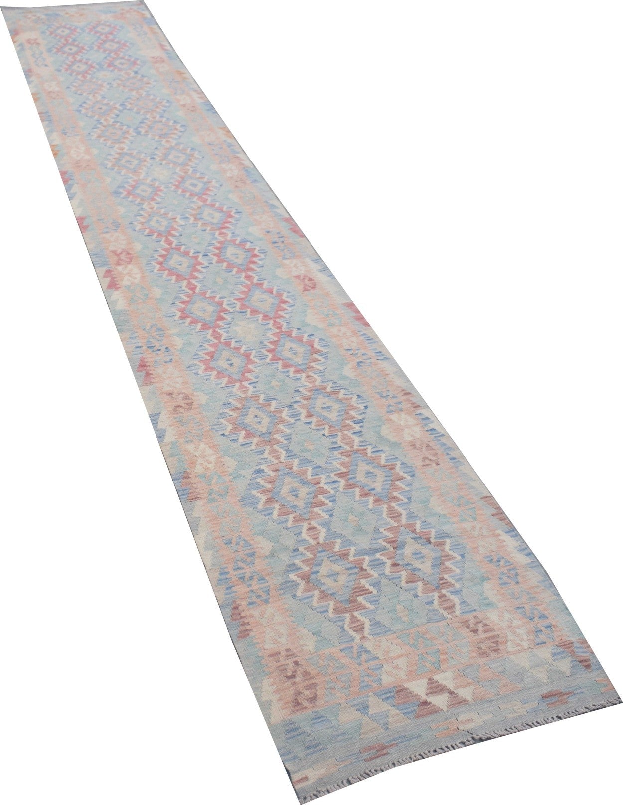 A handmade Afghan Maimana wool runner rug featuring a repeating geometric pattern in soft colors.