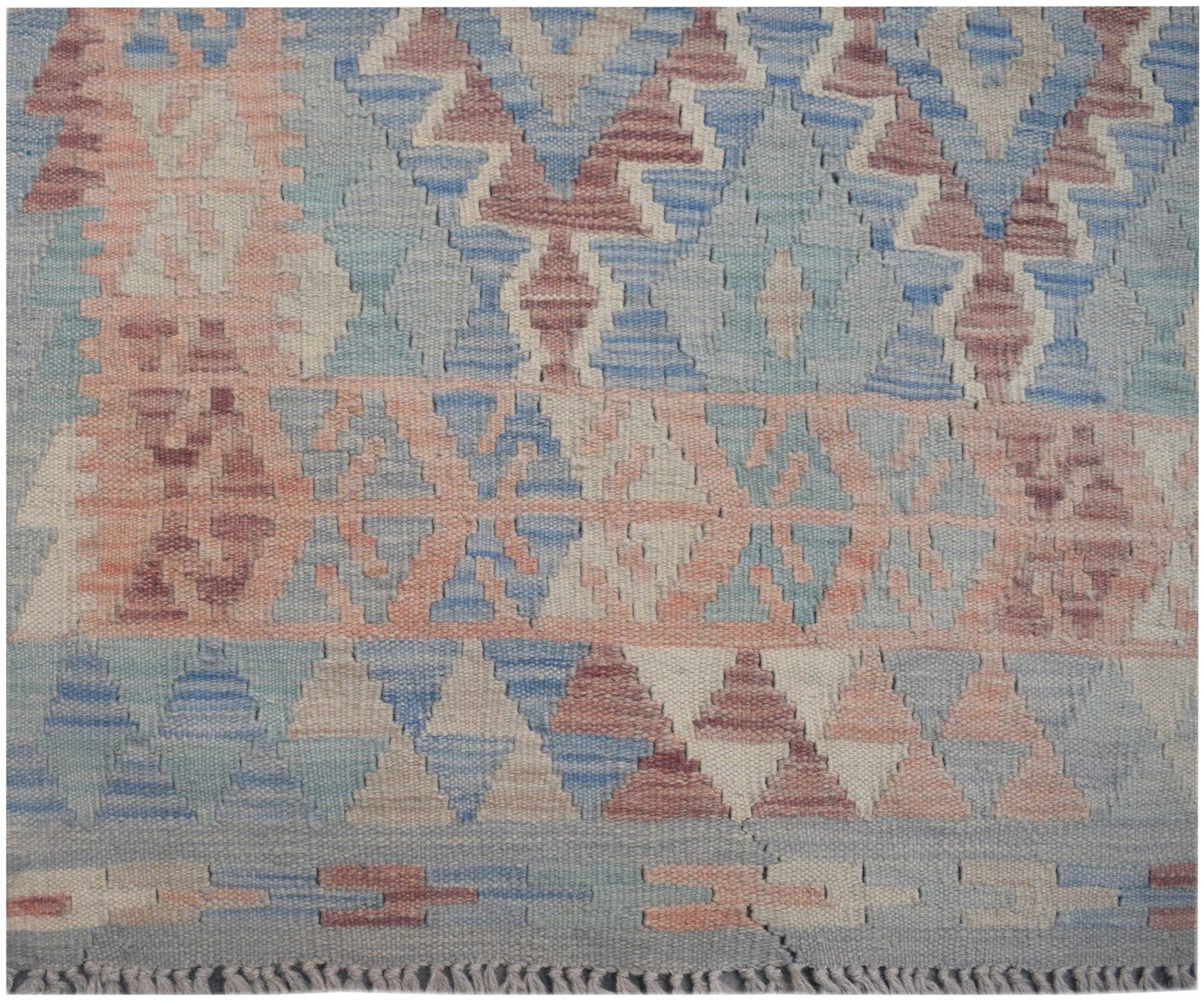 Handmade Afghan Maimana kilim runner featuring a geometric pattern in muted blue and peach tones.