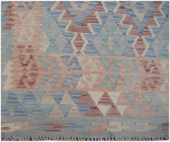 Handmade Afghan Maimana kilim runner featuring a geometric pattern in muted blue and peach tones.