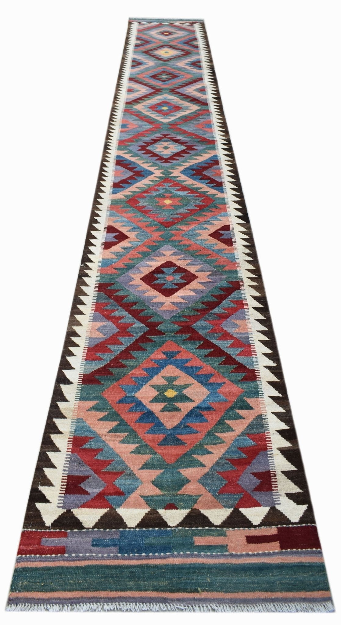 Handwoven Afghan Maimana wool runner rug featuring a colorful geometric diamond pattern.