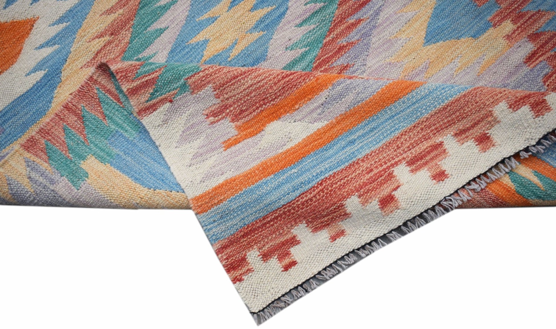 A handwoven Afghan Maimana wool kilim runner featuring a colorful geometric pattern.