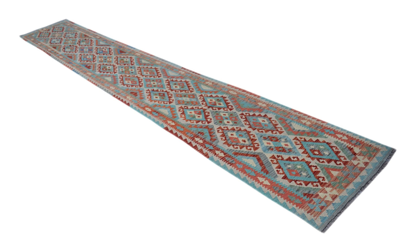 A long, handmade Afghan Maimana Kilim runner featuring a geometric diamond pattern in red and blue.