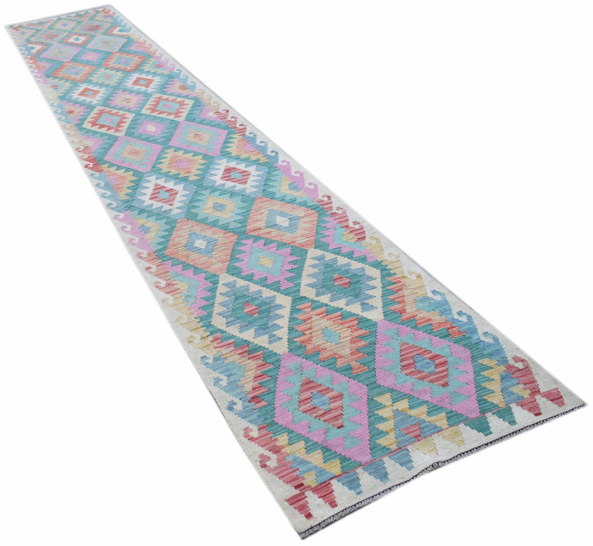 A handmade Afghan Maimana wool runner rug featuring a colorful geometric diamond pattern.