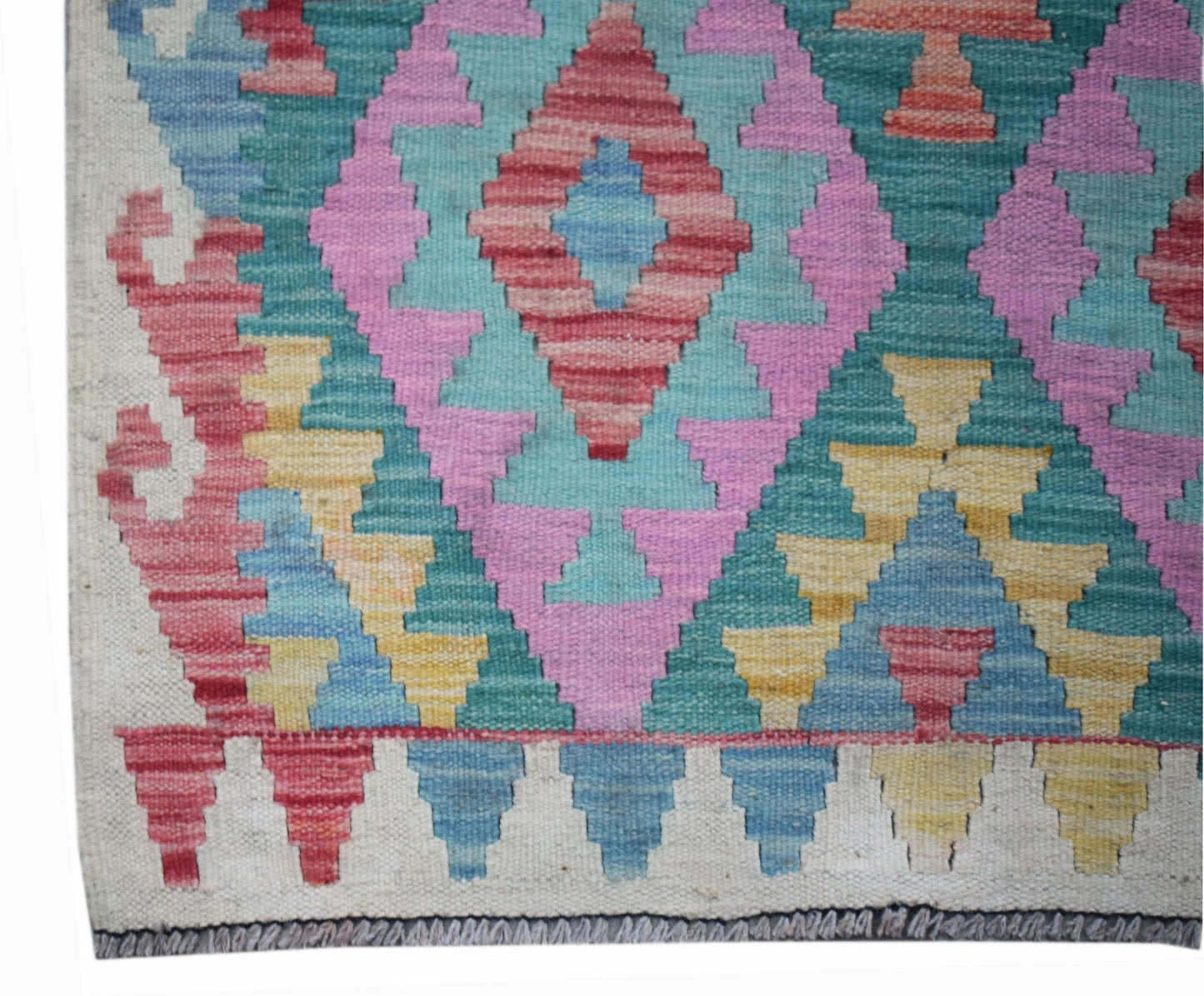 Handwoven Afghan Maimana wool runner featuring a colorful geometric diamond pattern.