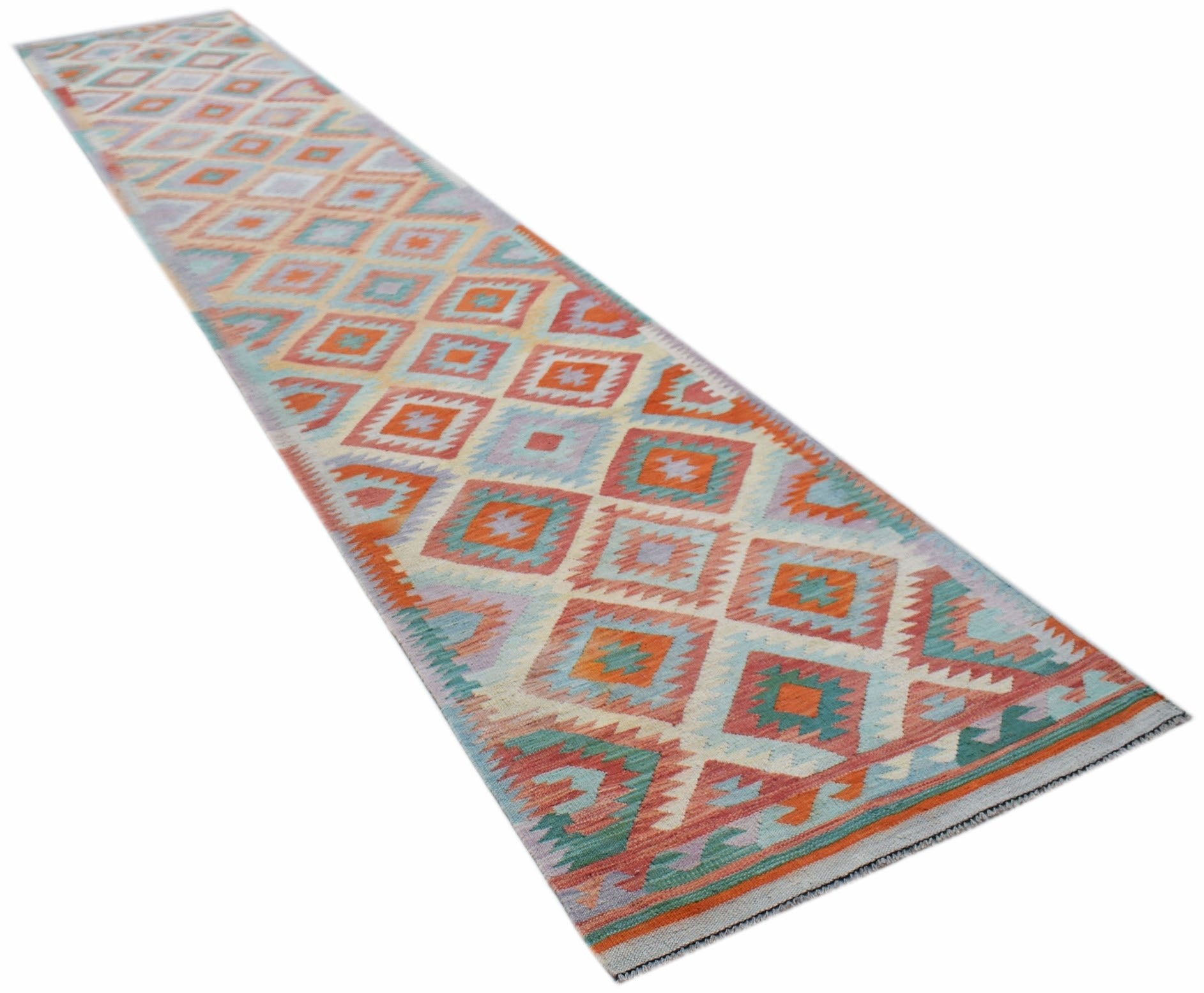 A handmade Afghan Maimana wool runner rug featuring a colorful geometric diamond pattern.