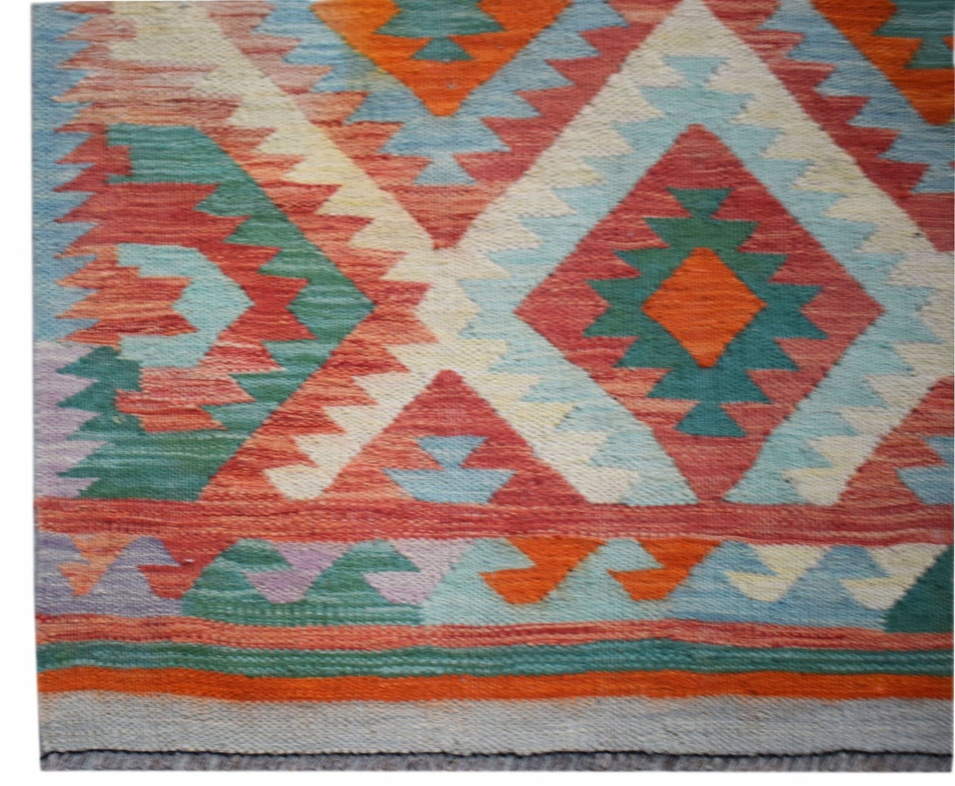 Handwoven Afghan Maimana wool runner featuring a vibrant geometric diamond pattern.