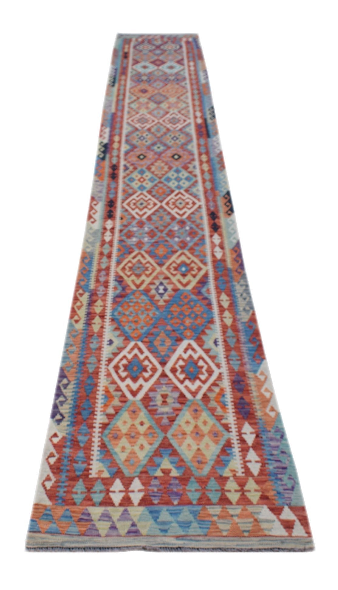 A long, handmade Afghan Maimana kilim runner featuring a vibrant geometric pattern in wool.