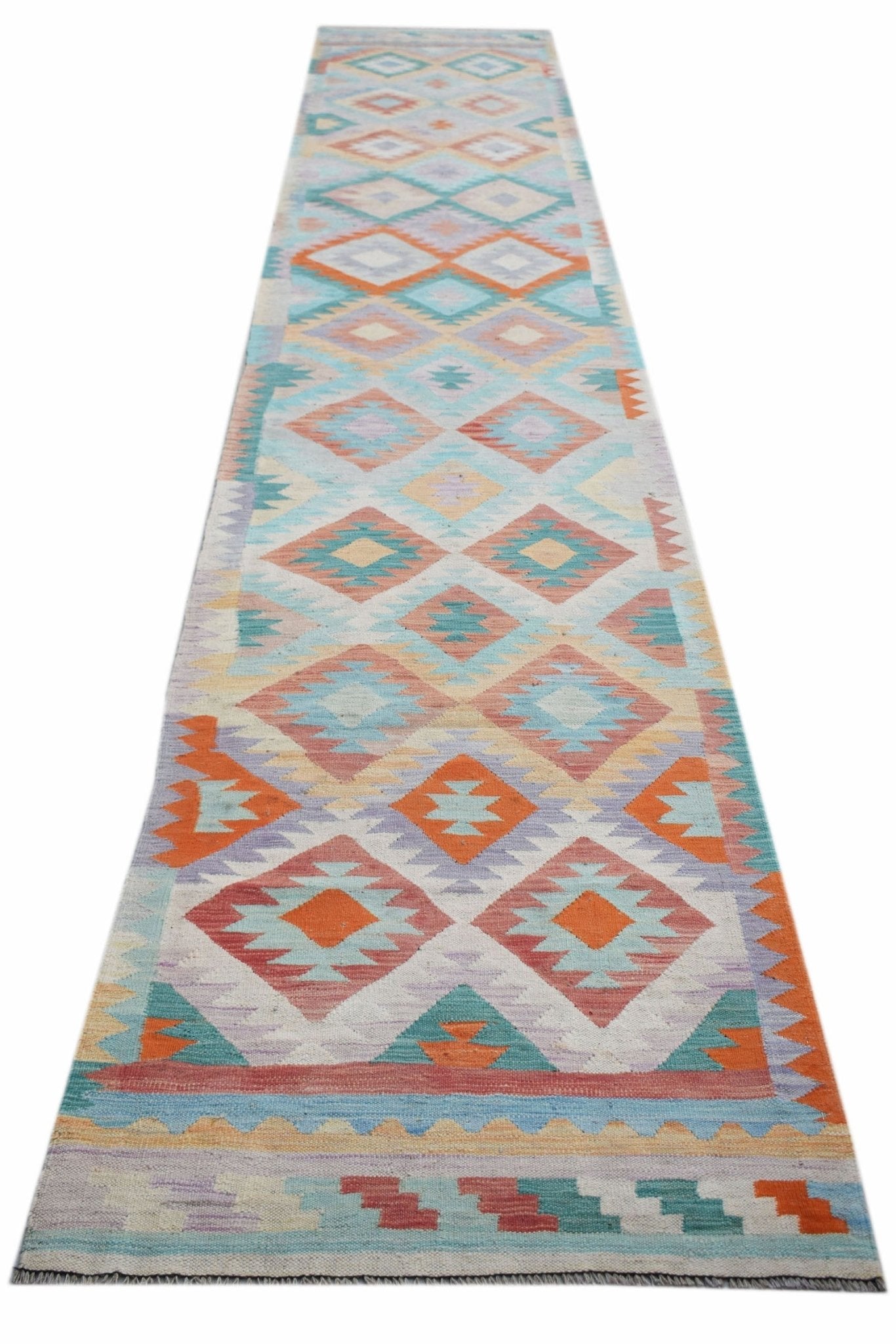 Handwoven Afghan Maimana wool runner featuring a colorful geometric diamond pattern.