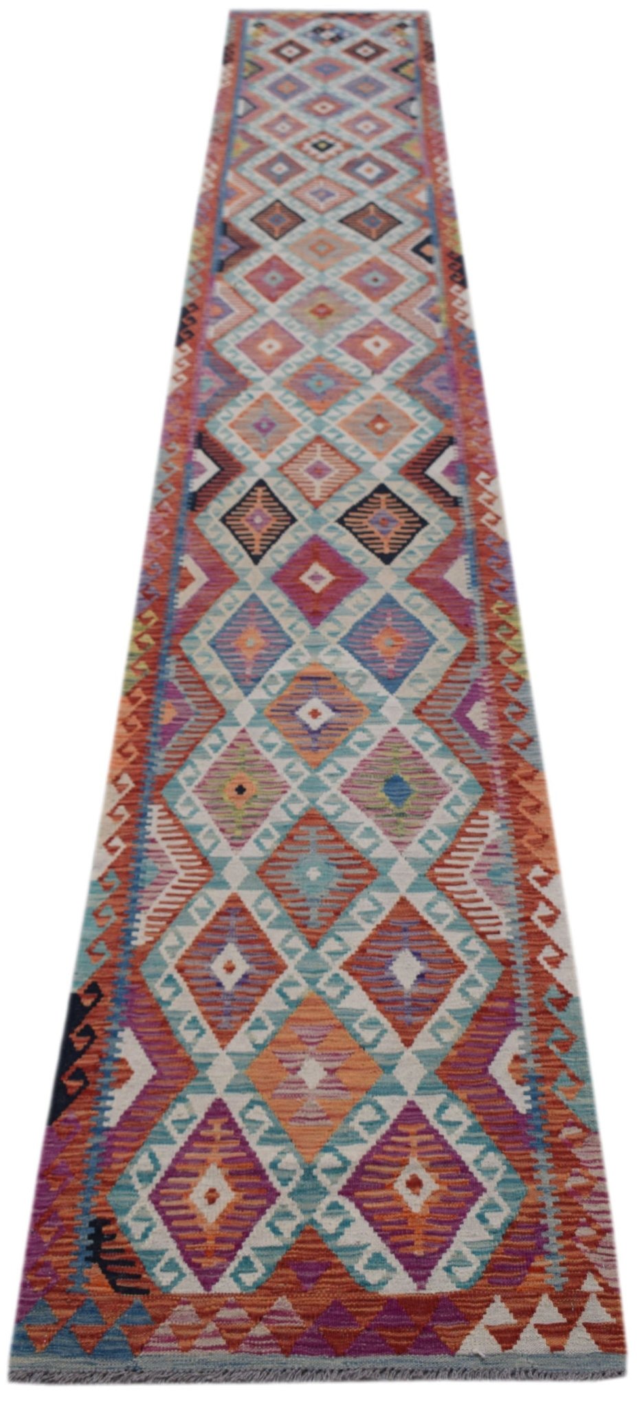 Handwoven Afghan Maimana wool runner rug featuring a colorful geometric diamond pattern.