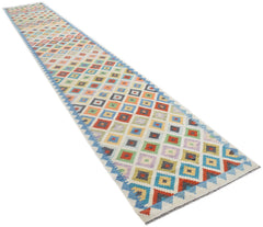 Handmade Afghan Maimana kilim runner featuring a colorful geometric diamond pattern.
