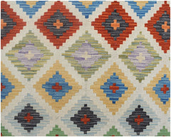 Handmade Afghan Maimana kilim runner featuring a repeating pattern of colorful geometric diamonds.