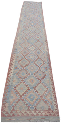 Handmade Afghan Maimana kilim runner featuring a geometric diamond pattern in soft blue and red.
