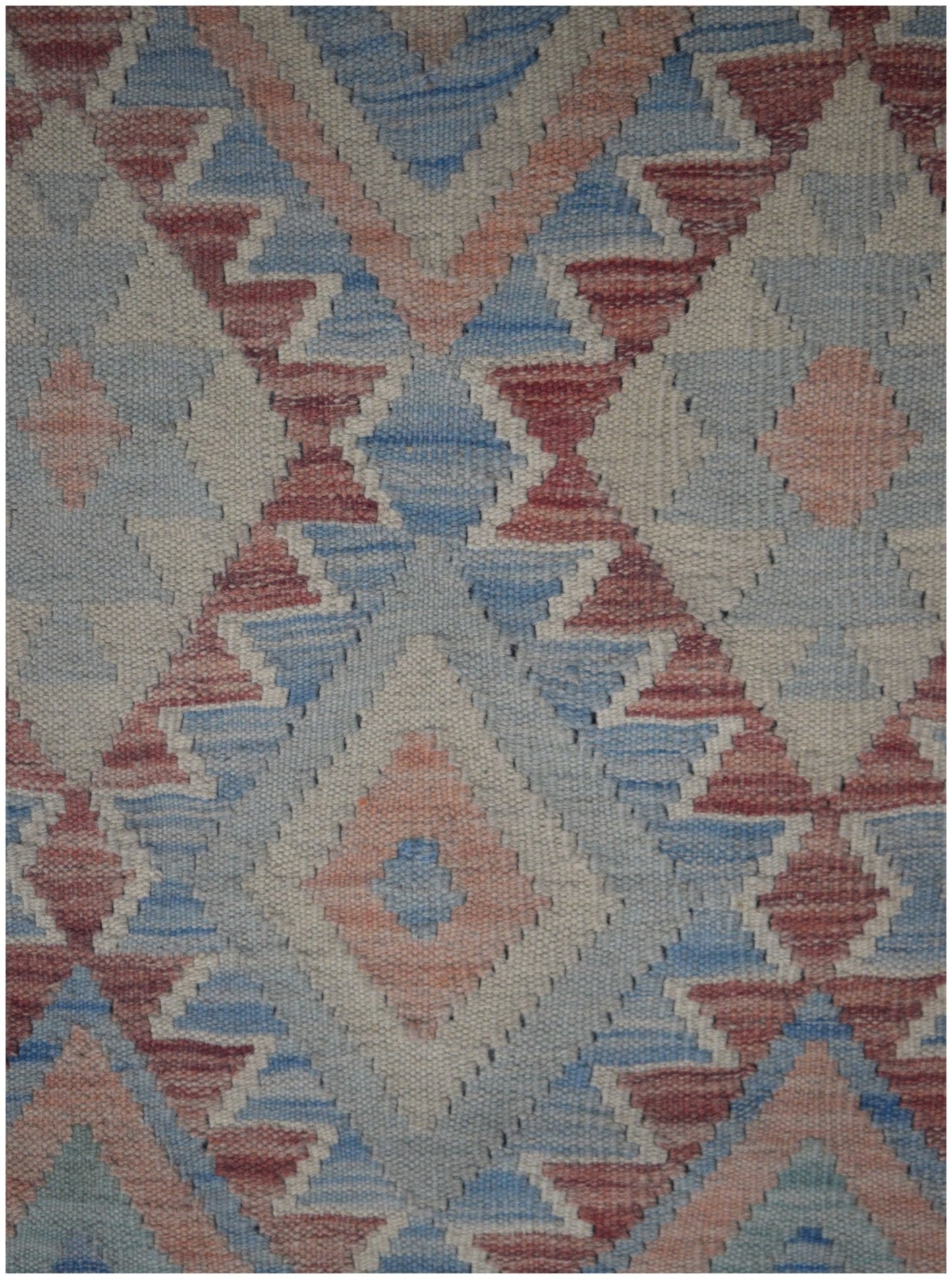 Handmade Afghan Maimana kilim runner featuring a geometric diamond pattern in blue and terracotta.