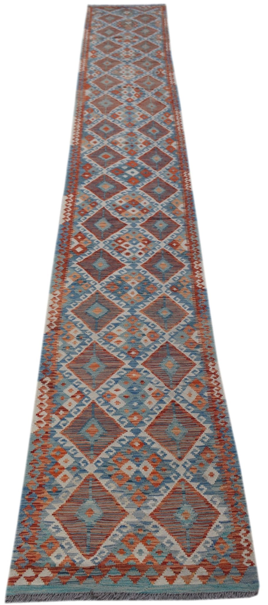 Handwoven Afghan Maimana wool runner rug featuring a geometric diamond pattern in blue and orange.