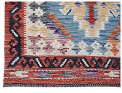 Handwoven Afghan Maimana wool kilim runner featuring a geometric pattern in vibrant colors.