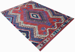 Handwoven Afghan Mazari Sharif kilim rug featuring a geometric pattern in red, blue, and grey.