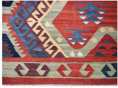 Handwoven Afghan Mazari Sharif kilim featuring geometric patterns in red, blue, and sage green.