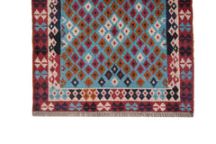 Handmade Afghan Pashm rug featuring a geometric diamond pattern in red, blue, and brown wool.