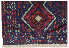 Handmade Afghan Pashm rug featuring a dark blue field with geometric red and ivory diamond motifs.