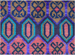 Handmade Afghan Pashm rug featuring a geometric pattern in shades of red, blue, and brown.