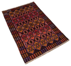 Handmade Afghan Pashm rug featuring a geometric diamond pattern in shades of red, orange, and brown.